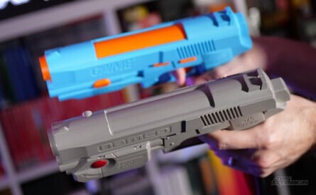 Here's the G'AIM'E gun compared to the Namco GunCon for PS1. Similar, no?